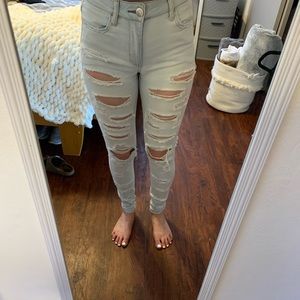 light blue ripped jeans